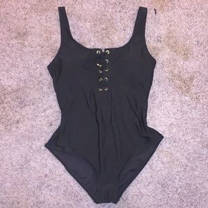 Green one piece bathing suit